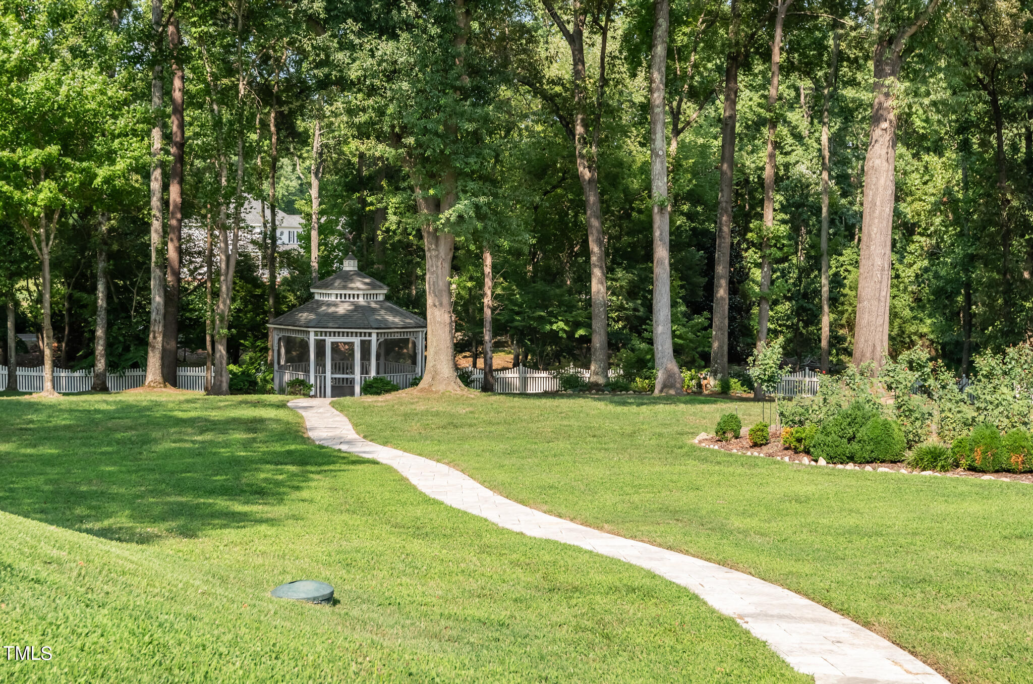 1936 Amethyst Ridge Road Raleigh, NC 27604 - Photo 56 of 74 a view of a house with a big yard potted plants and large tree