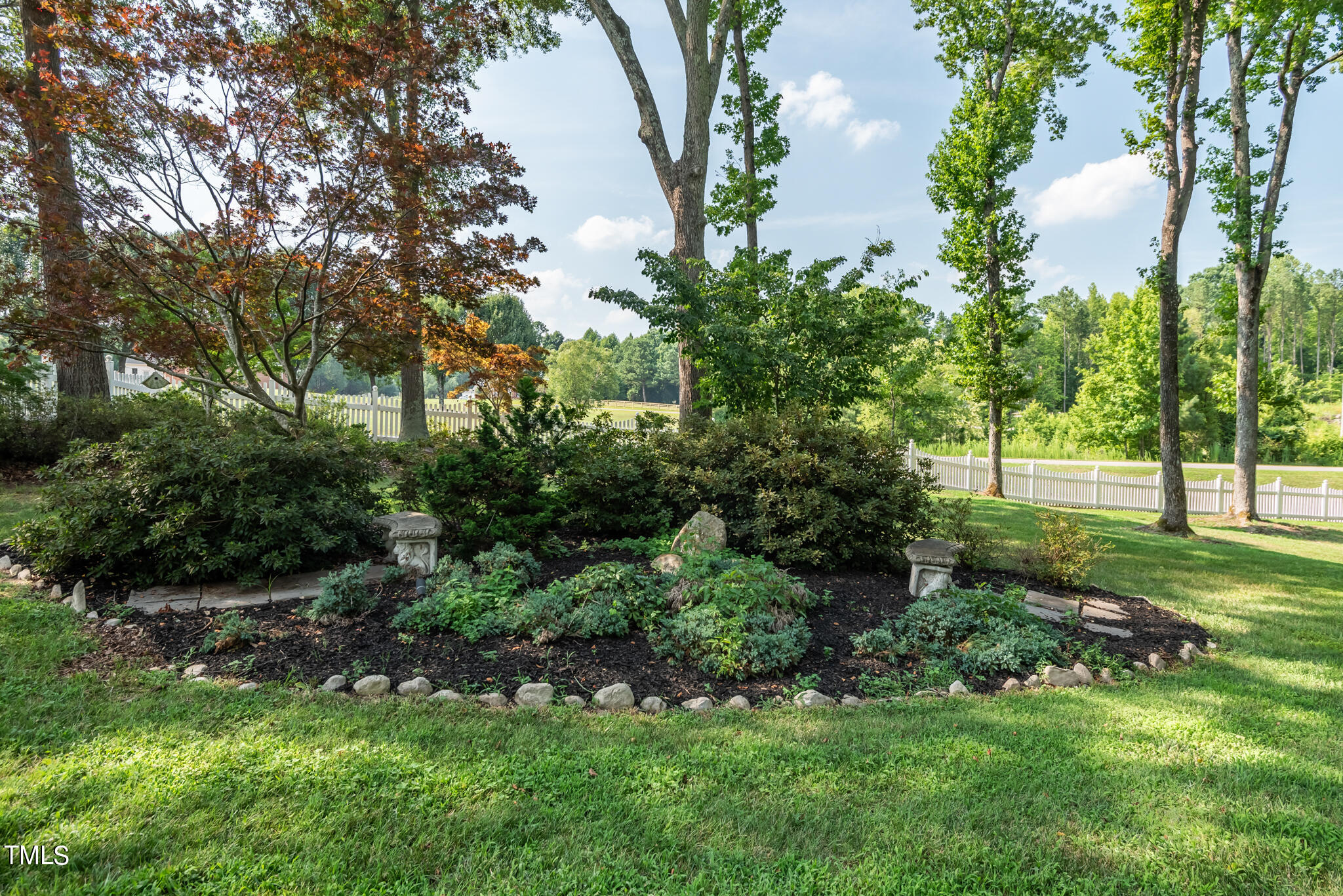 1936 Amethyst Ridge Road Raleigh, NC 27604 - Photo 58 of 74 a view of a garden with large trees