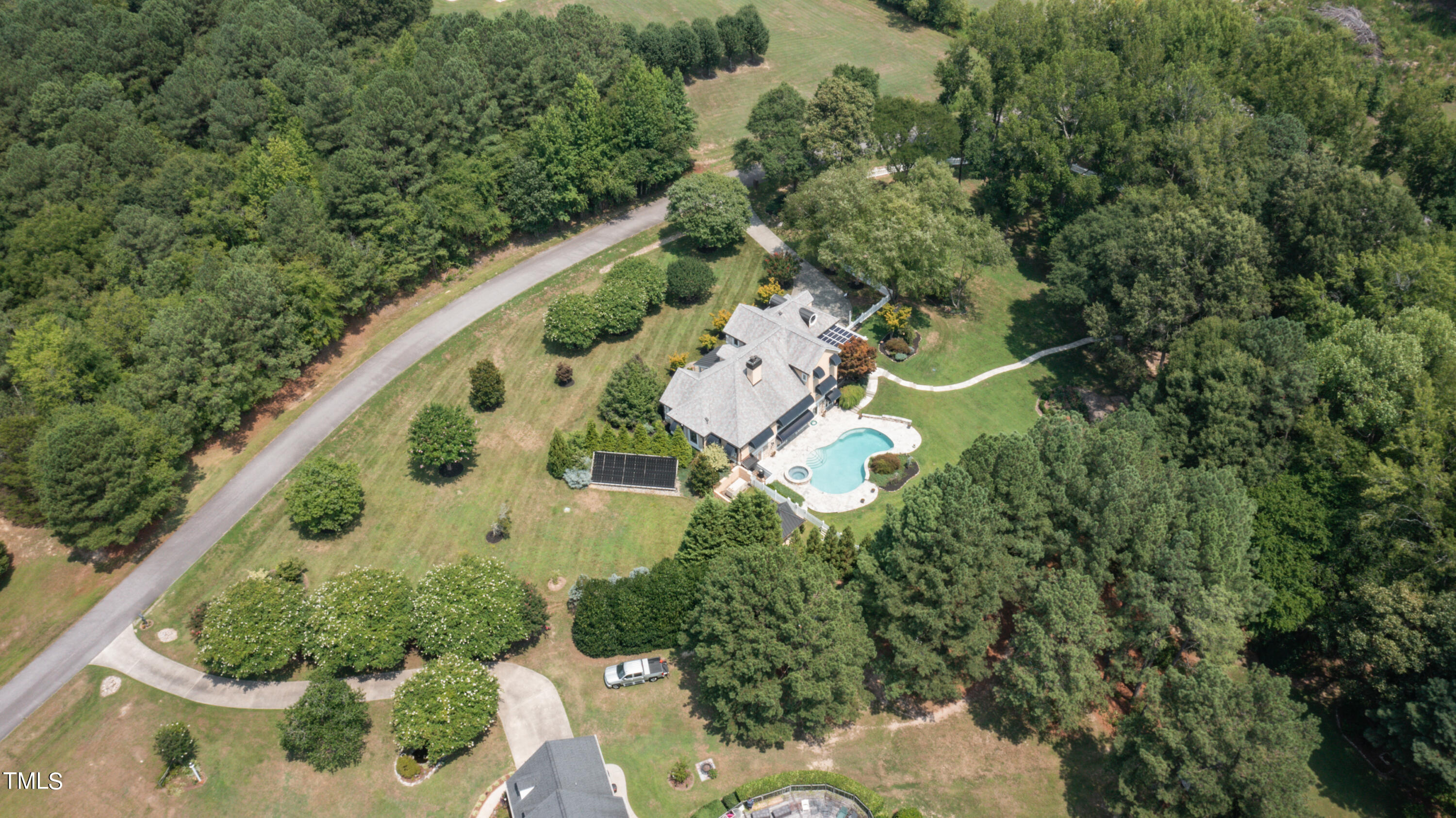 1936 Amethyst Ridge Road Raleigh, NC 27604 - Photo 69 of 74 an aerial view of house with yard swimming pool and outdoor seating