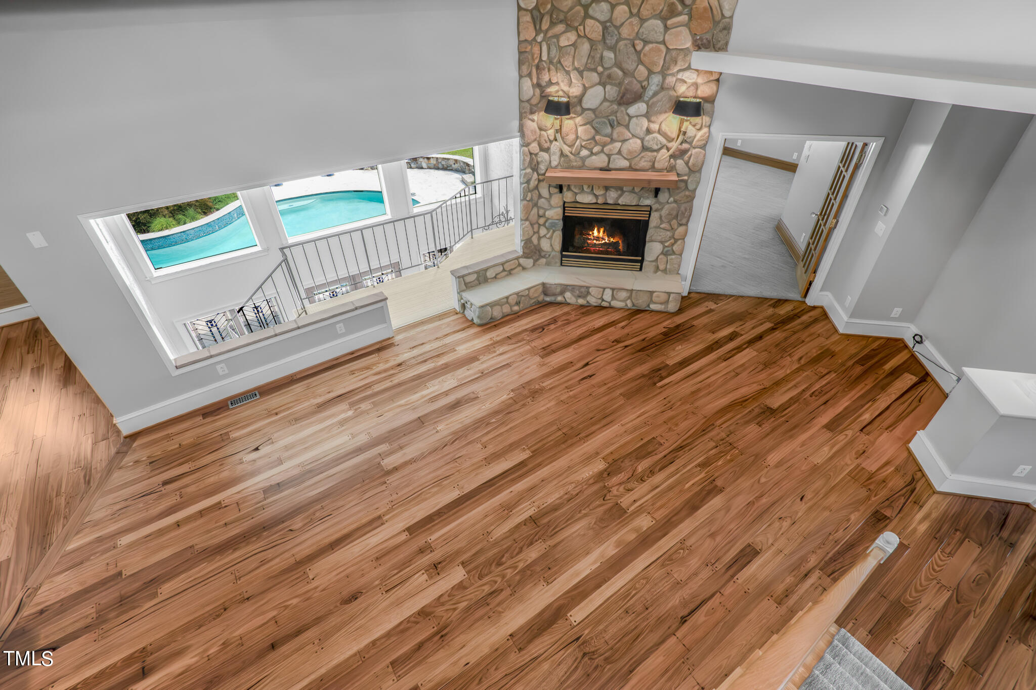 1936 Amethyst Ridge Road Raleigh, NC 27604 - Photo 7 of 74 a spacious bedroom with a bed and a fireplace