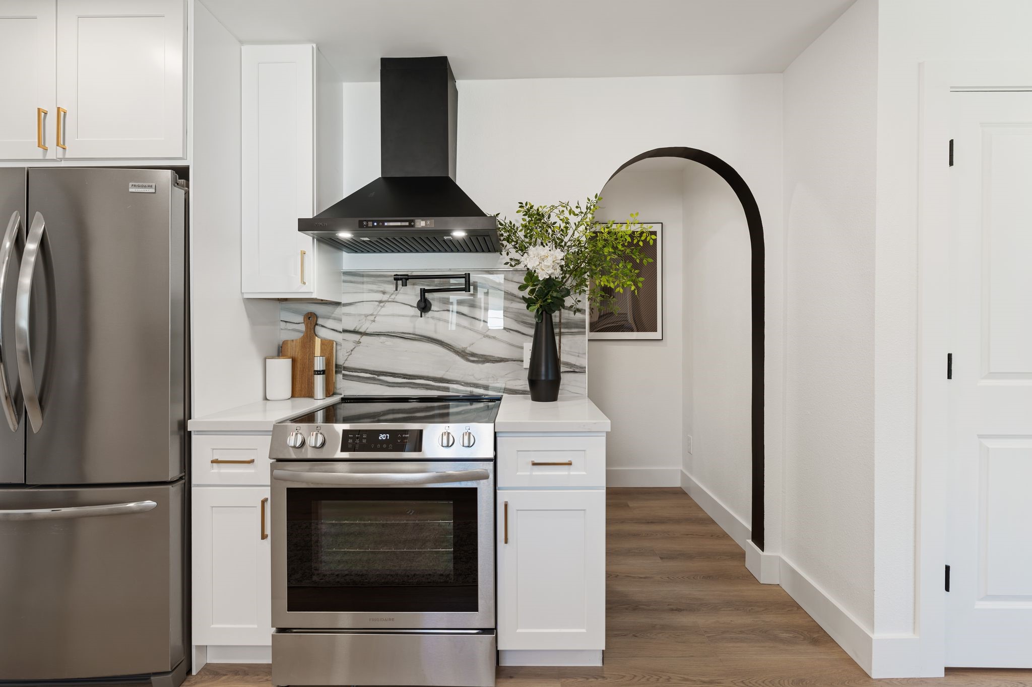 6902 Stoney River Drive Spring, TX 77379 - Photo 13 of 32 Spectacular arches emphasize the contemporary appeal.