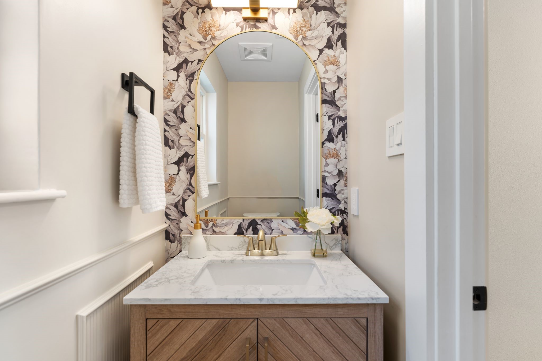 6902 Stoney River Drive Spring, TX 77379 - Photo 16 of 32 A powder room is conveniently located on the 1st floor just off the kitchen.