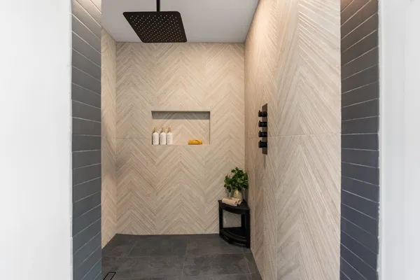 a bathroom with a sink and mirror