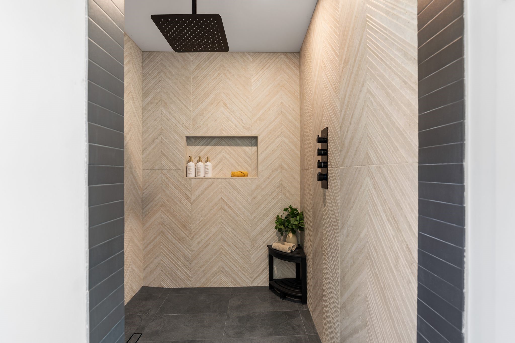 6902 Stoney River Drive Spring, TX 77379 - Photo 24 of 32 An exquisite walk in shower with a built in shampoo & shaving niche and oversized rainfall shower head.