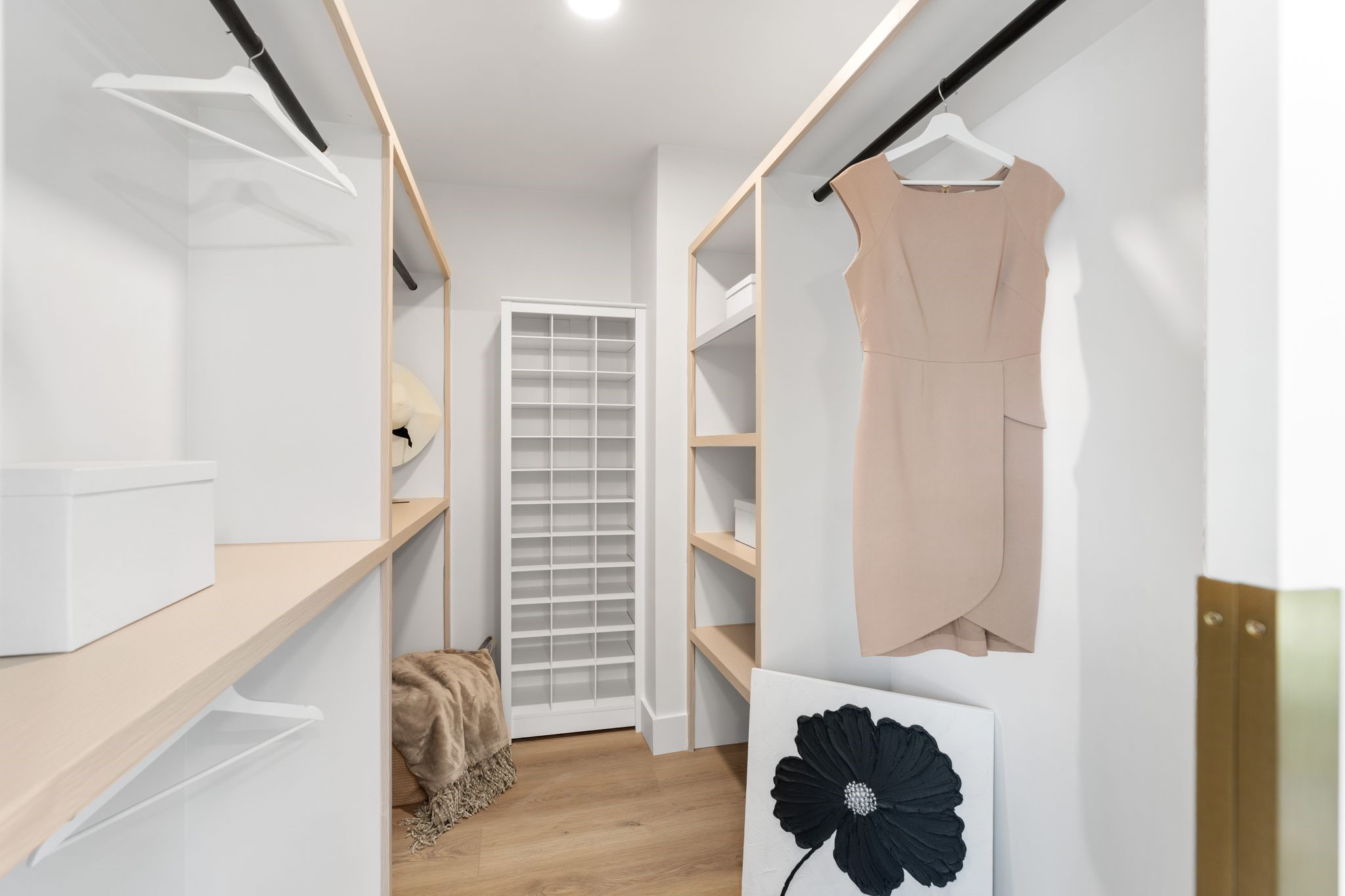 6902 Stoney River Drive Spring, TX 77379 - Photo 25 of 32 The walk-in closet is outfitted with custom shelving for impeccable organization and a full-length mirrored door for a special touch.