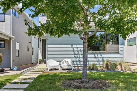 a house view with a garden space