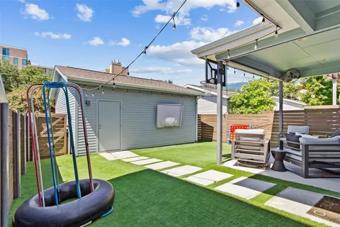 a backyard of a house with seating space