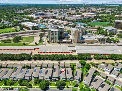 an aerial view of residential building with lake view