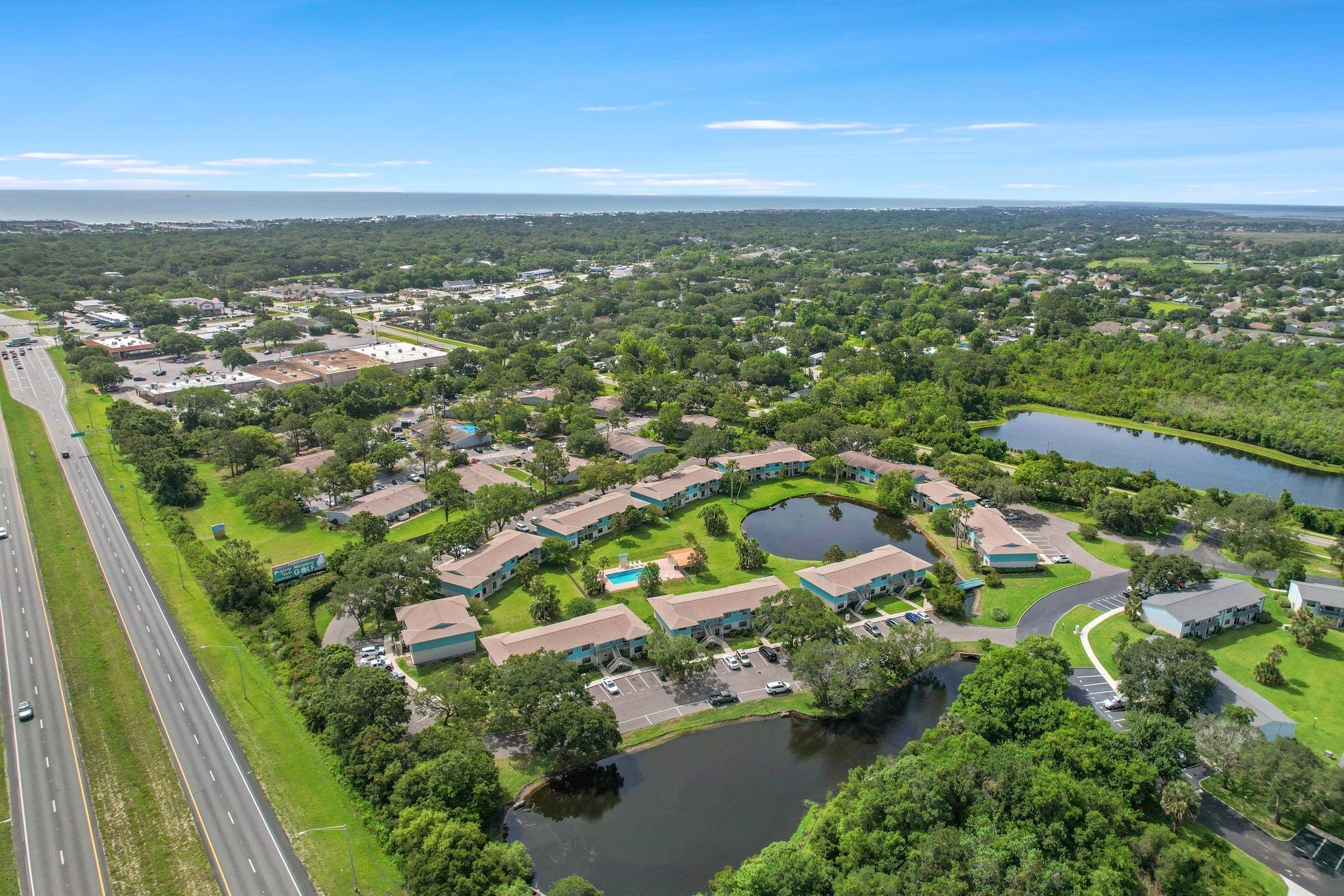 650 West Pope Road, Unit 265 St. Augustine, FL 32080 - Photo 18 of 32 an aerial view of residential houses with outdoor space