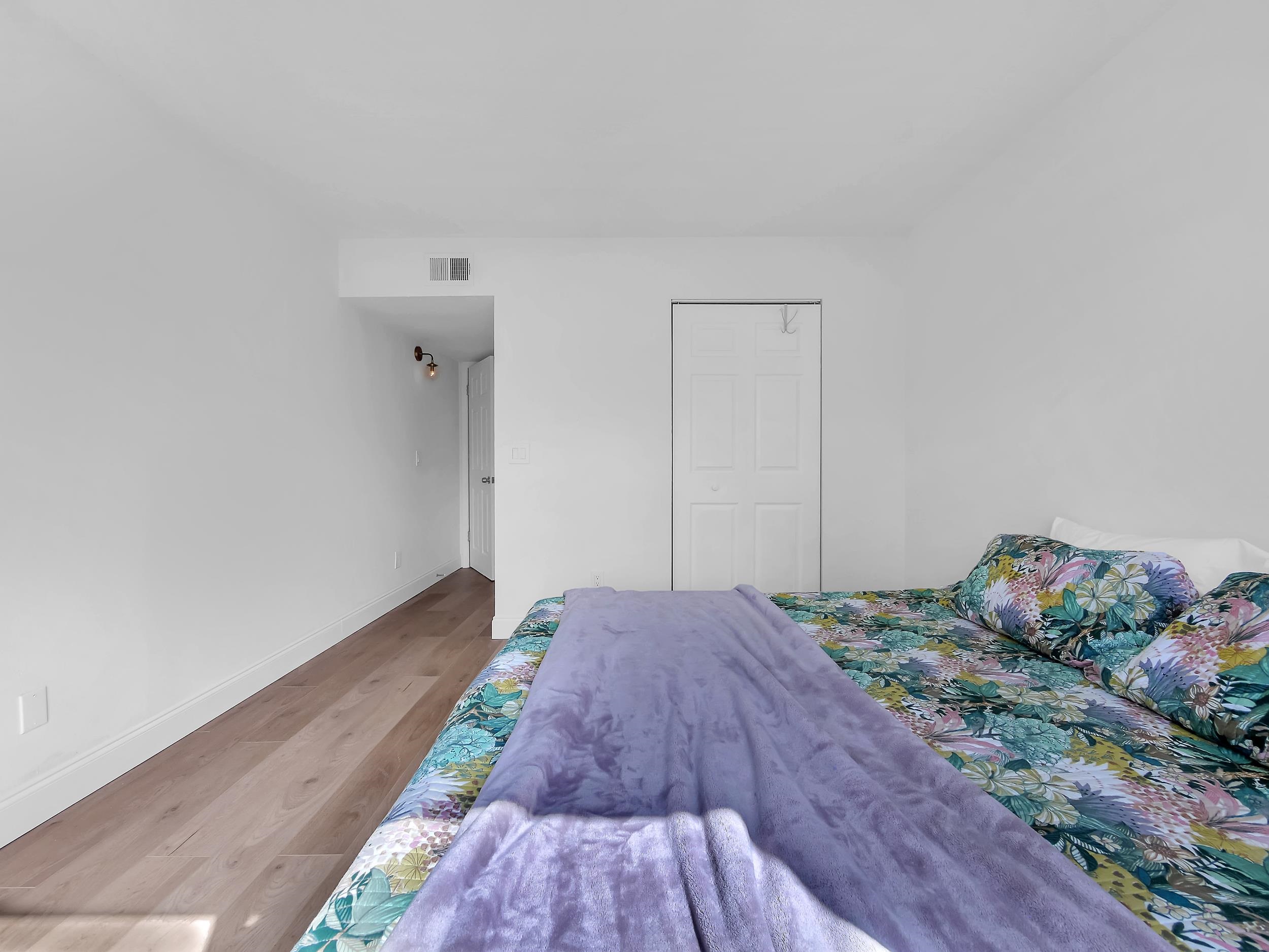650 West Pope Road, Unit 265 St. Augustine, FL 32080 - Photo 26 of 32 a view of bedroom with a bed and wooden floor