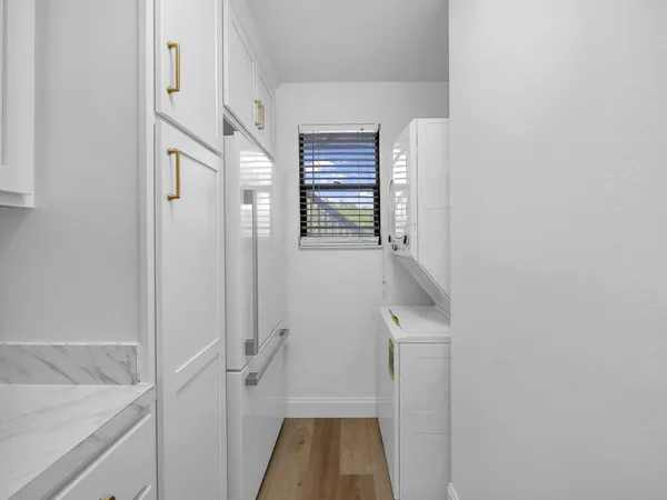 a bathroom with a sink and shower