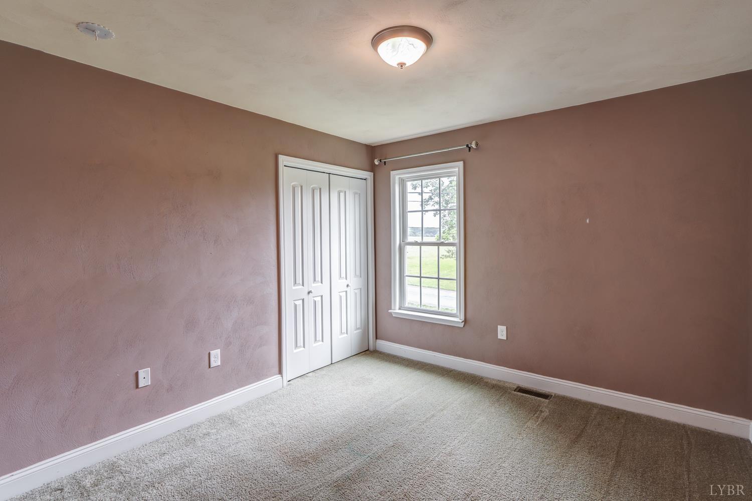 1057 Old Trail Road Forest, VA 24551 - Photo 40 of 49 an empty room with windows