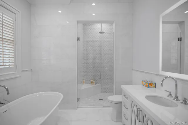 a aerial view of a house with swimming pool and porch