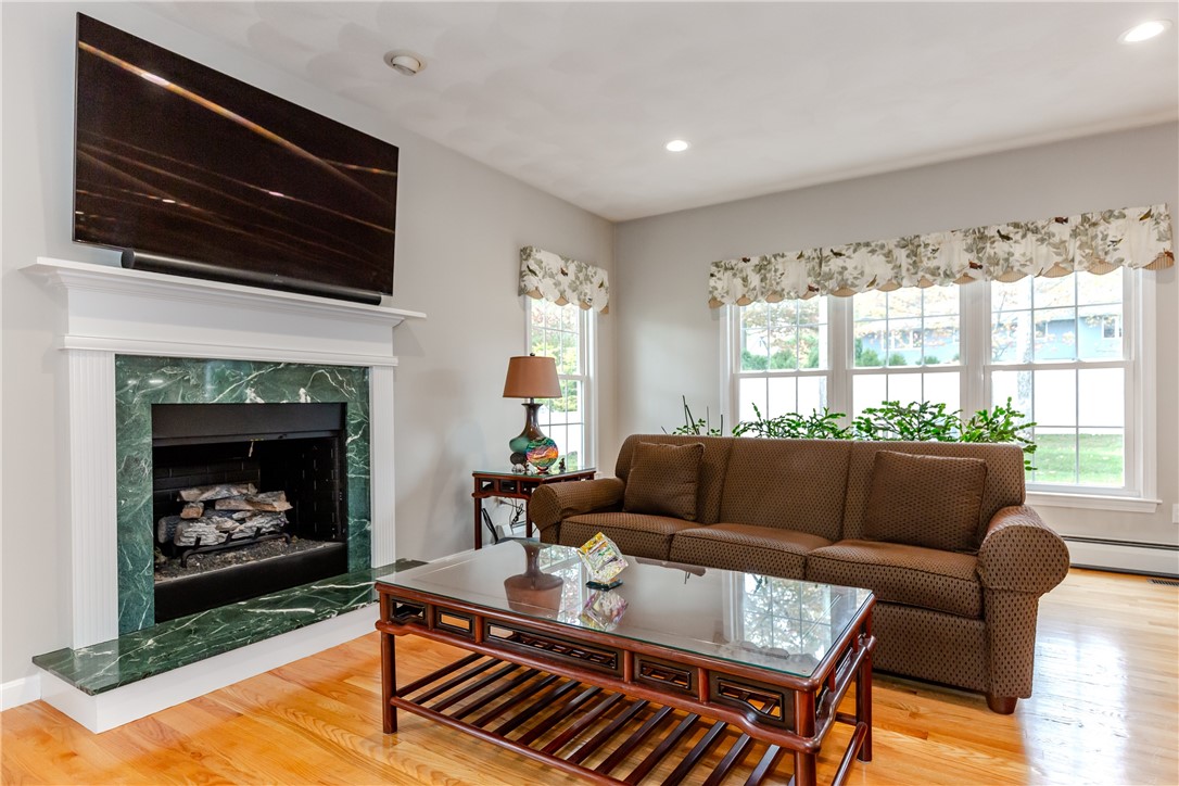 11 Raven Circle Cranston, RI 02921 - Photo 6 of 49 Family room with fireplace