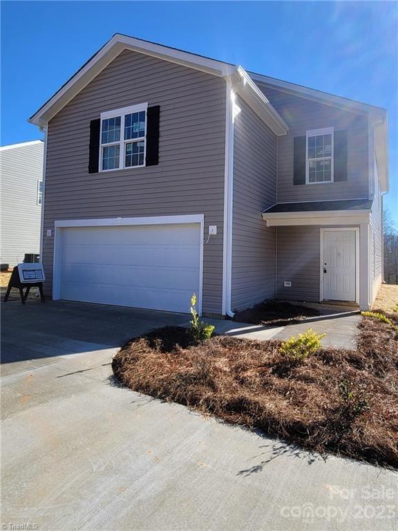 1118 Baileys Chapel Road Advance, NC 27006 - Photo 1 of 10 a house view with a outdoor space