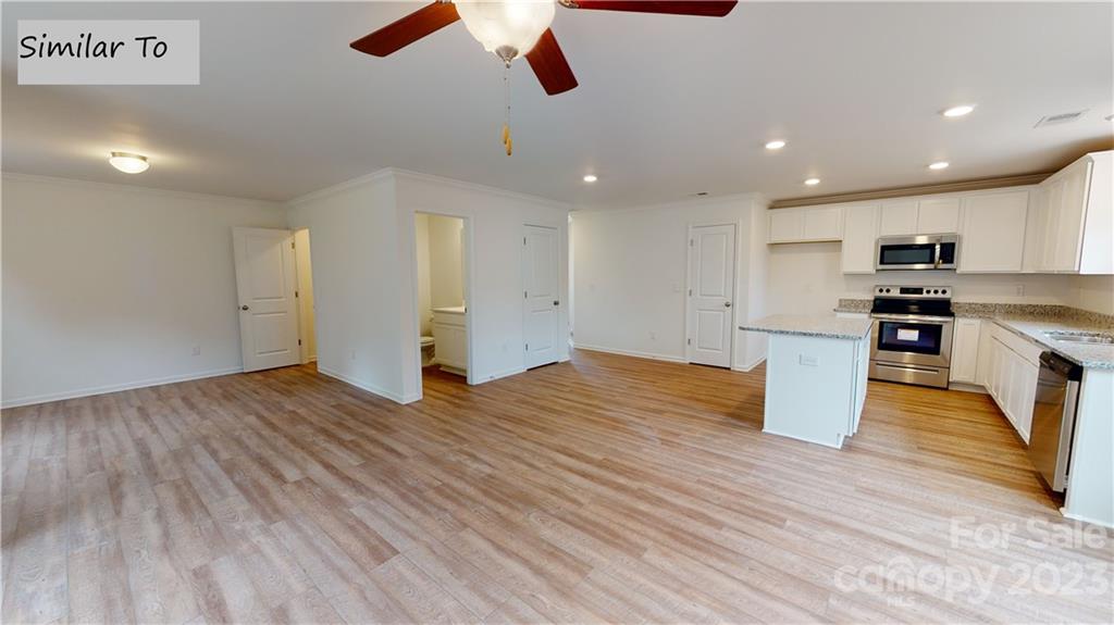 1118 Baileys Chapel Road Advance, NC 27006 - Photo 2 of 10 a view of empty room with wooden floor