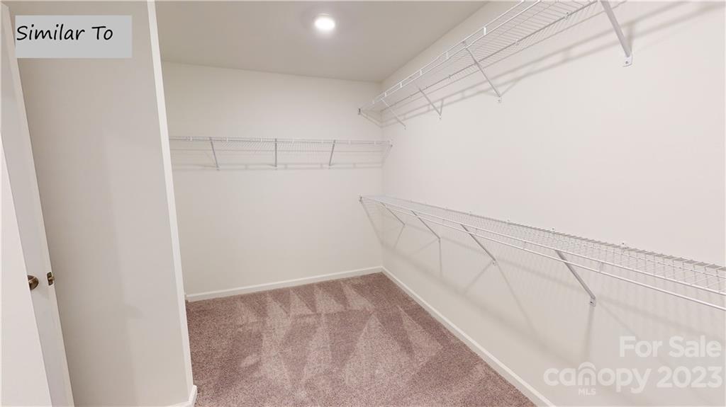 1118 Baileys Chapel Road Advance, NC 27006 - Photo 10 of 10 a view of a room with racks on the wall