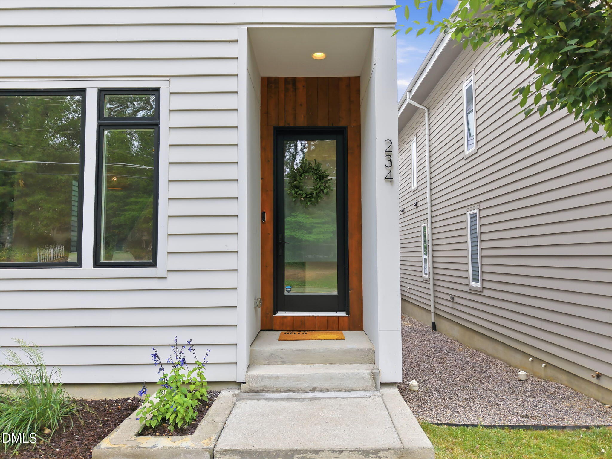 234 Powell Drive Raleigh, NC 27606 - Photo 6 of 46 15-web-or-mls-DJI_20260522143827_0041_D