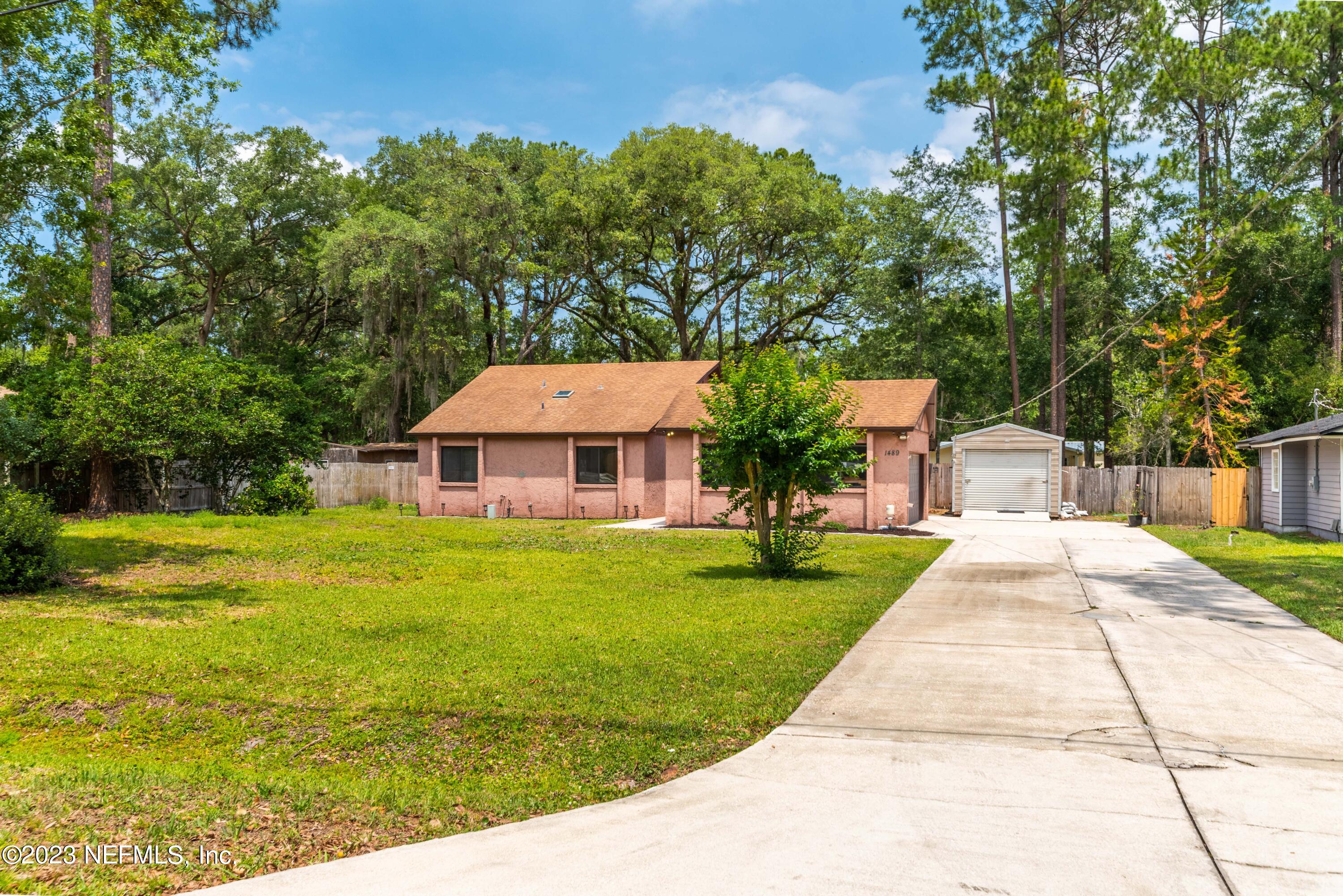 1489 Satsuma Road St. Johns, FL 32259 - Photo 3 of 32 a front view of a house with garden