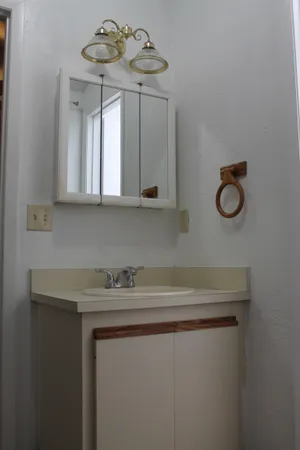 a bathroom with a bathtub and a toilet