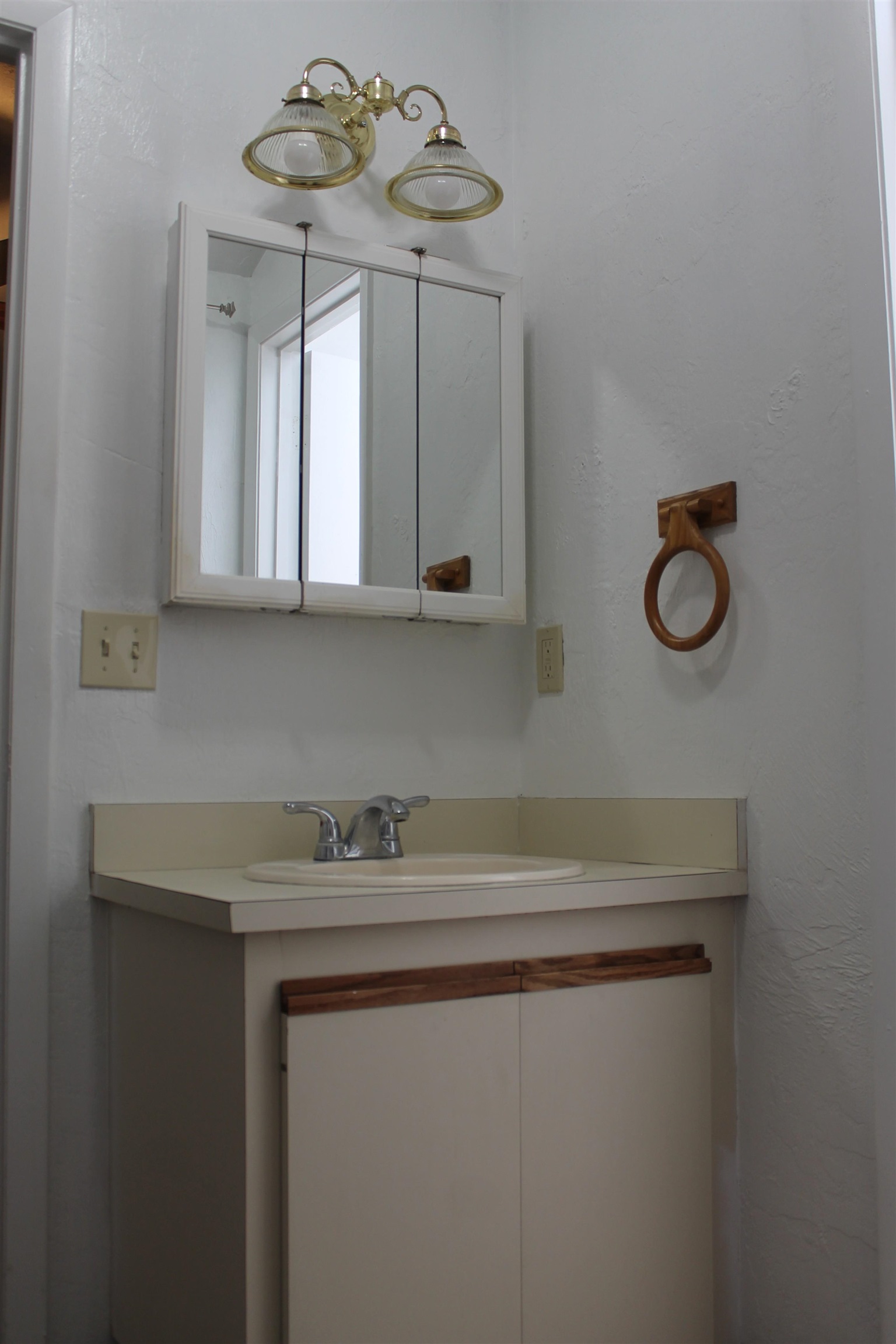 3601 Windjammer Lane St. Augustine, FL 32084 - Photo 19 of 22 a bathroom with a sink and a mirror