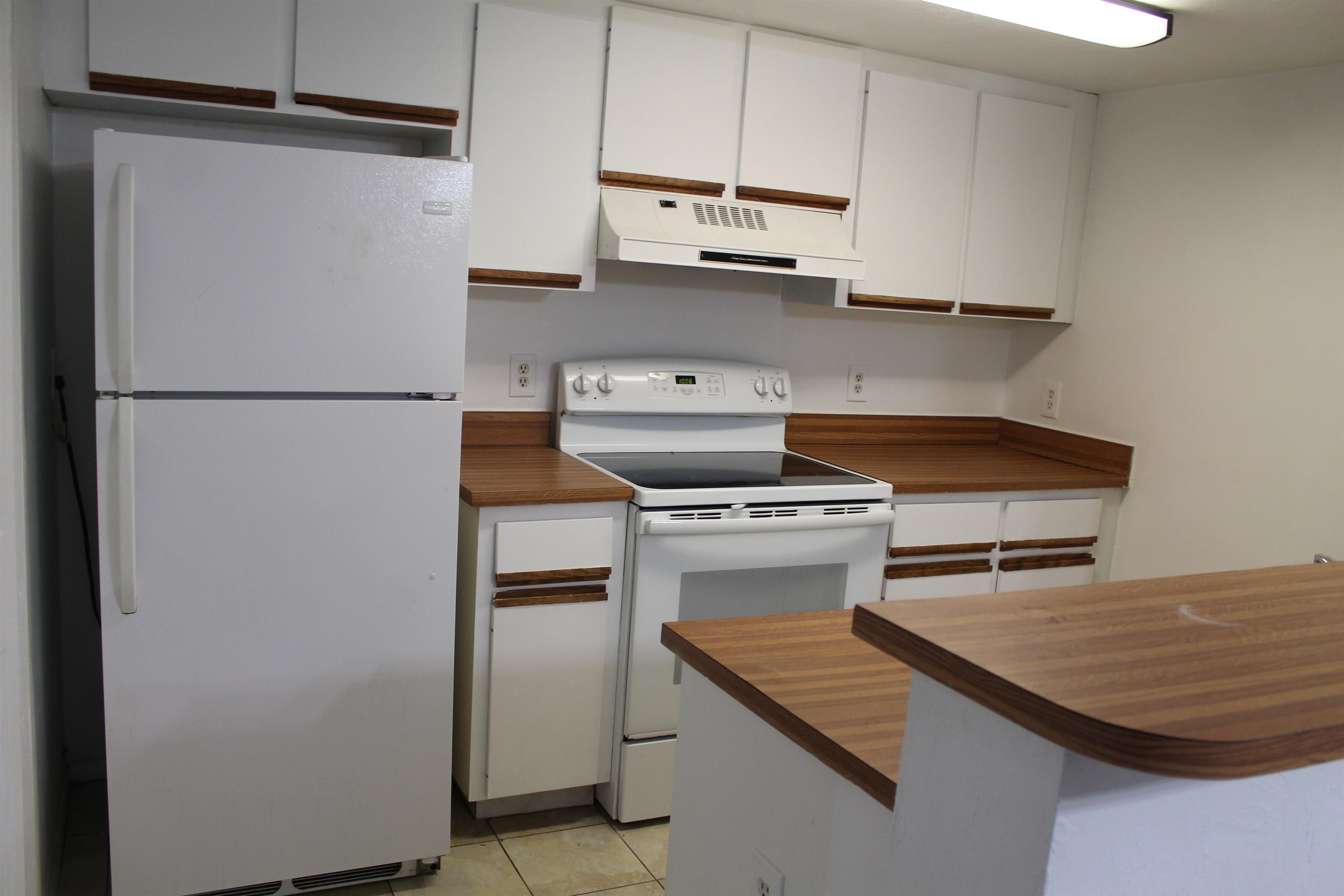 3601 Windjammer Lane St. Augustine, FL 32084 - Photo 3 of 22 a kitchen with stainless steel appliances granite countertop a refrigerator and a stove