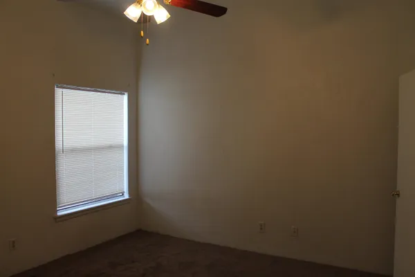 a view of a small space with a fan