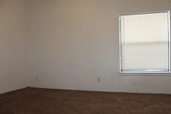 an empty room with an entryway