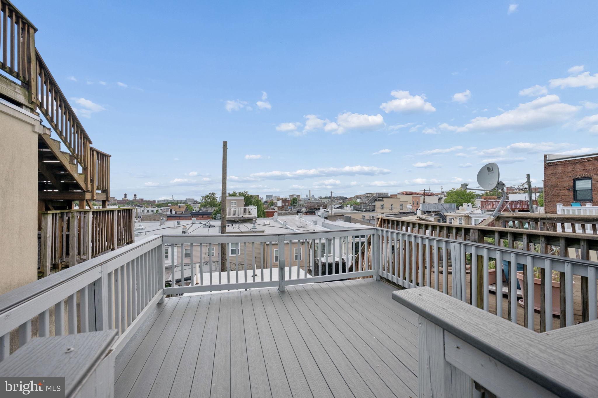 1108 South Clinton Street Baltimore, MD 21224 - Photo 43 of 66 Charming rooftop retreat with skyline views.