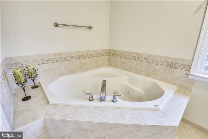 35 Old Solomons Island Road Lothian, MD 20711 - Photo 10 of 43 Soaking tub in main level bath of addition