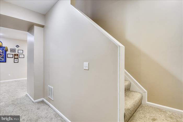 35 Old Solomons Island Road Lothian, MD 20711 - Photo 25 of 43 Stairs to lower level in main home