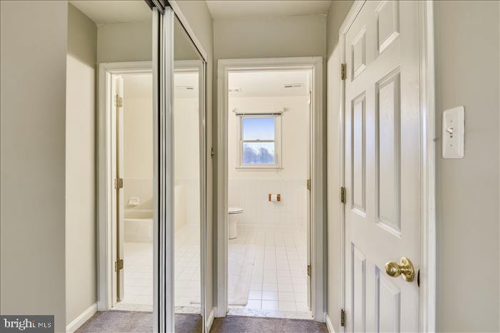 35 Old Solomons Island Road Lothian, MD 20711 - Photo 30 of 43 Entry hallway into addition
