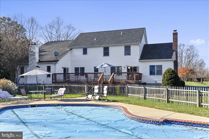35 Old Solomons Island Road Lothian, MD 20711 - Photo 33 of 43 Rear elevation of home & pool setting