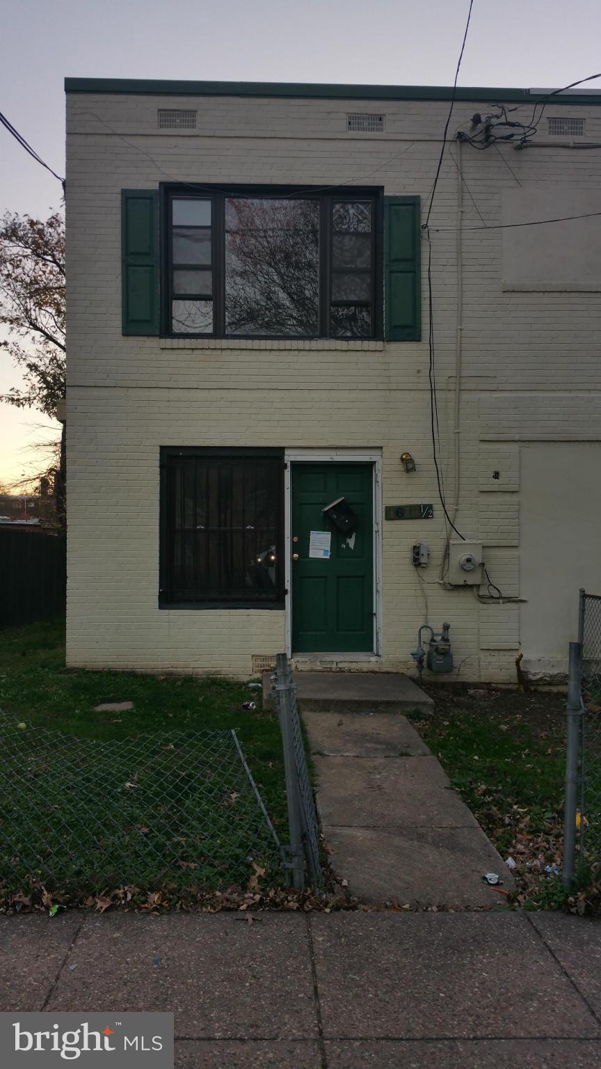 1617 Butler Street Southeast Washington, DC 20020 - Photo 2 of 16 a front view of a house with garden