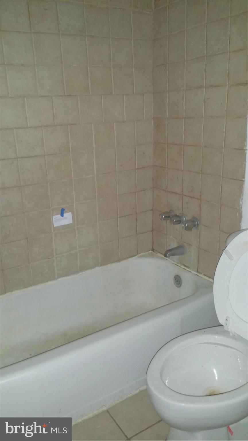 1617 Butler Street Southeast Washington, DC 20020 - Photo 11 of 16 a bathroom with a toilet and a shower