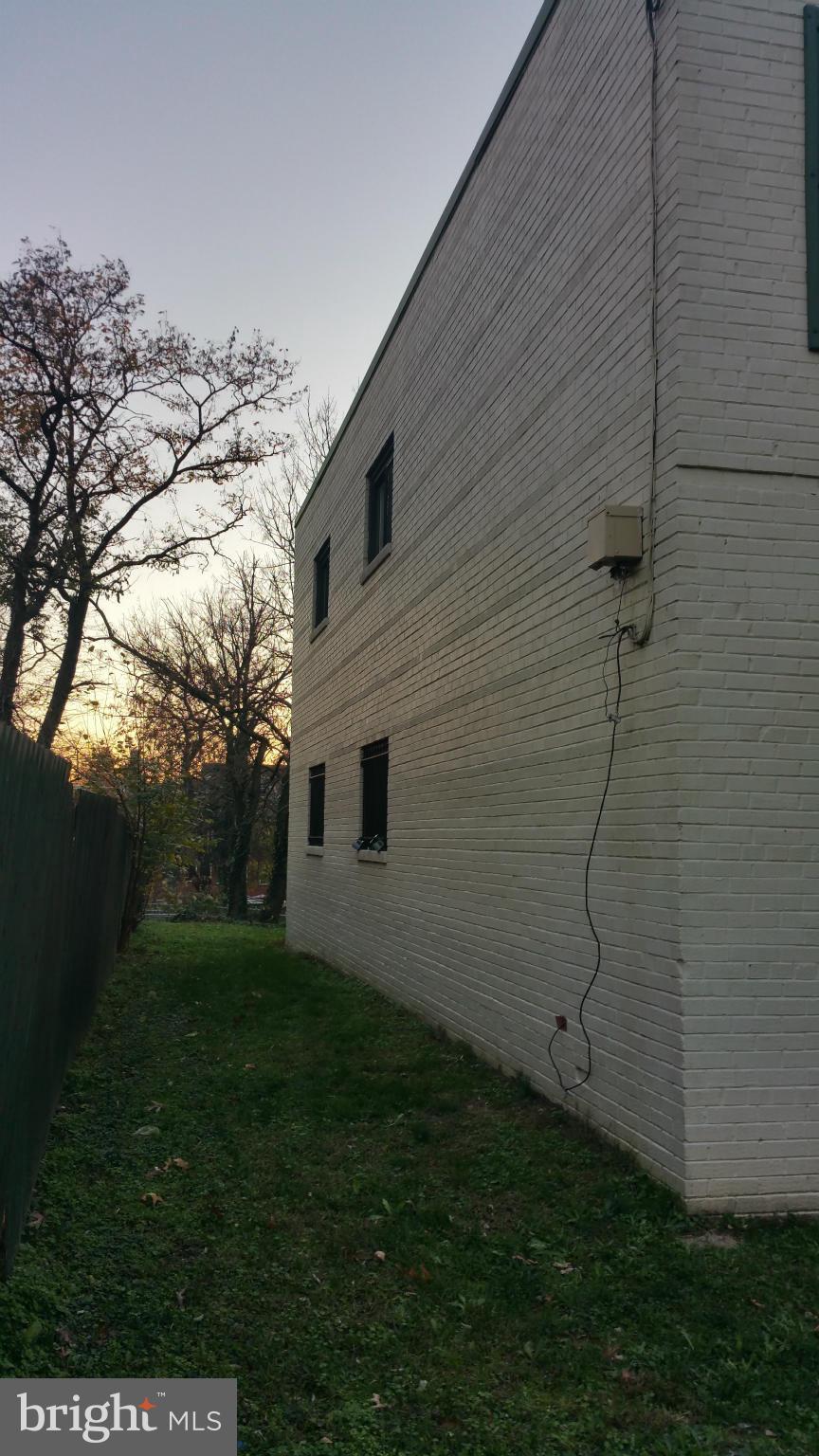 1617 Butler Street Southeast Washington, DC 20020 - Photo 3 of 16 a backyard of a house
