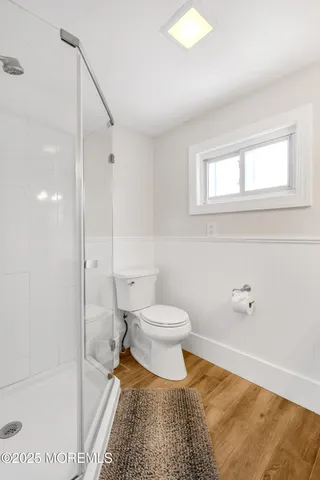 a bathroom with a sink toilet and vanity