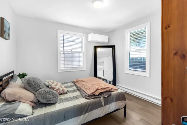 a view of a house with patio and a yard