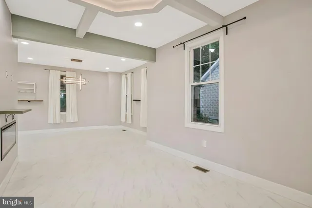 a bathroom with a toilet a sink and shower