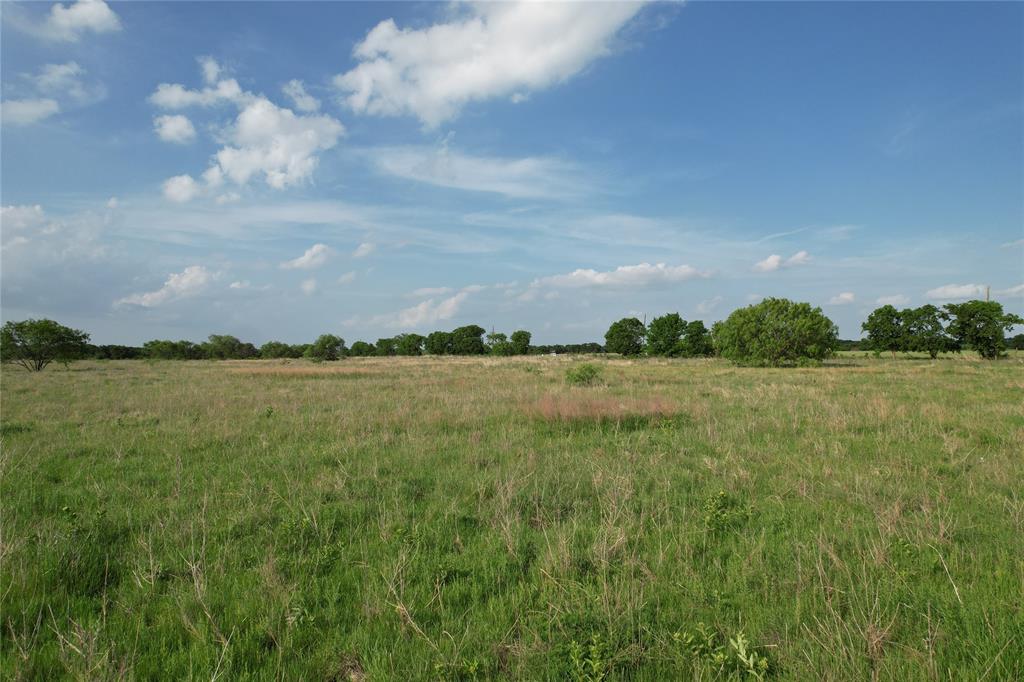 1 Bounds Road, Unit 110 Gunter, TX 75058 - Photo 2 of 10 a view of a lake with houses in the back