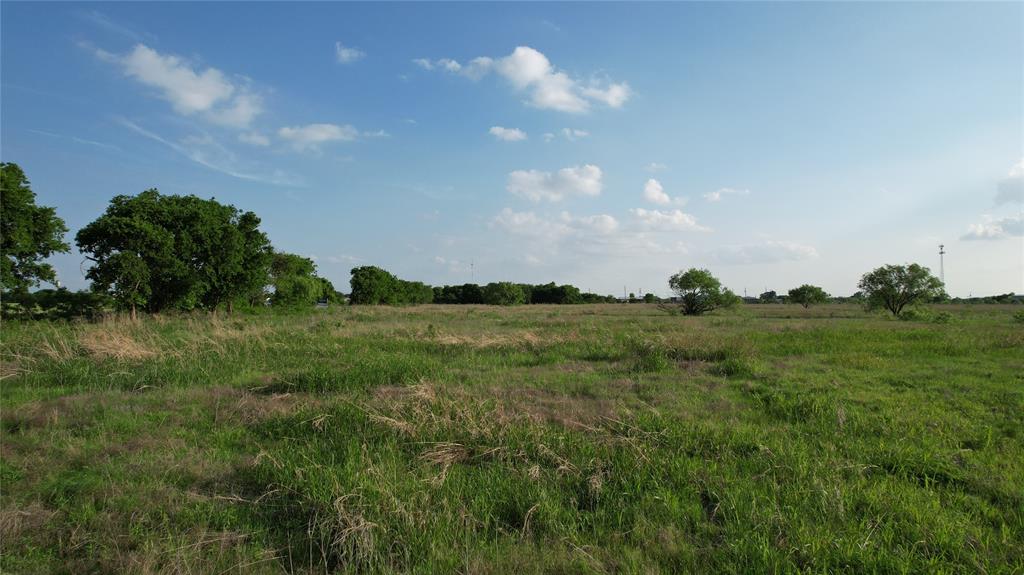 1 Bounds Road, Unit 110 Gunter, TX 75058 - Photo 3 of 10 a view of an ocean and green field