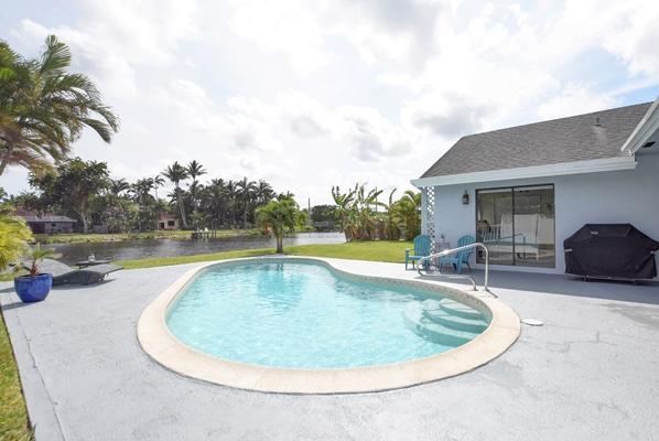 1520 Cormorant Road Delray Beach, FL 33444 - Photo 26 of 35 Pool Deck to Water