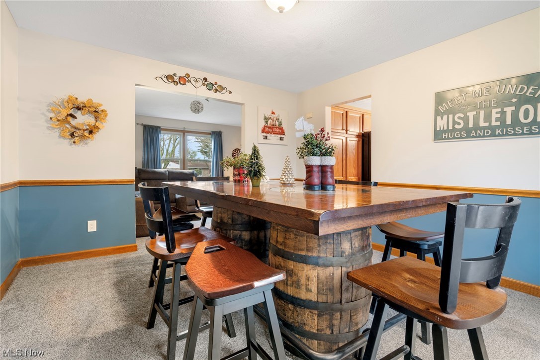 4915 Monticello Street Northwest Canton, OH 44708 - Photo 11 of 31 Dining Room featuring light colored carpet