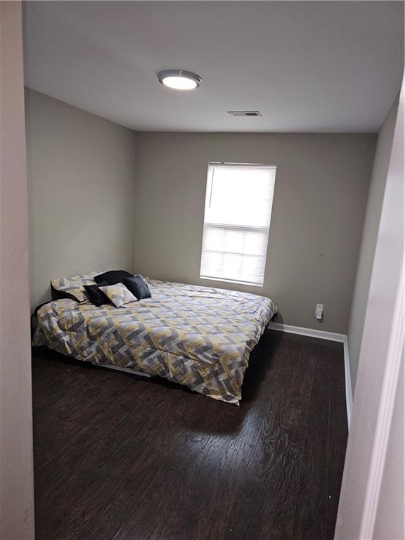 3503 Ebb Circle Fairburn, GA 30213 - Photo 11 of 12 a bedroom with a bed and window
