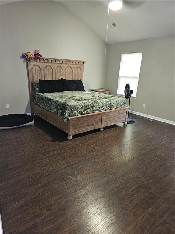 3503 Ebb Circle Fairburn, GA 30213 - Photo 10 of 12 a bedroom with a bed and a table in it