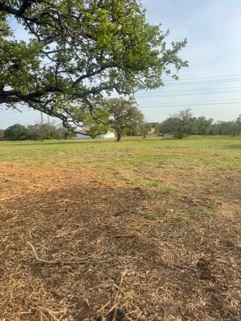 View of grassy yard featuring a view of rural / pastoral area