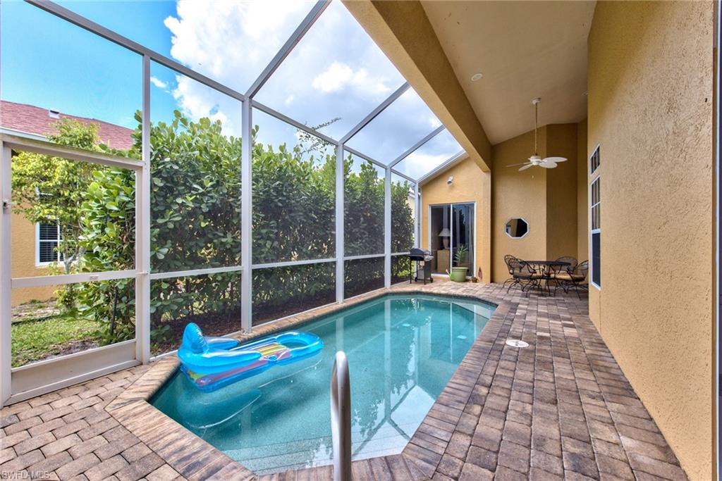 3748 Kent Drive Naples, FL 34112 - Photo 24 of 30 a view of swimming pool with patio