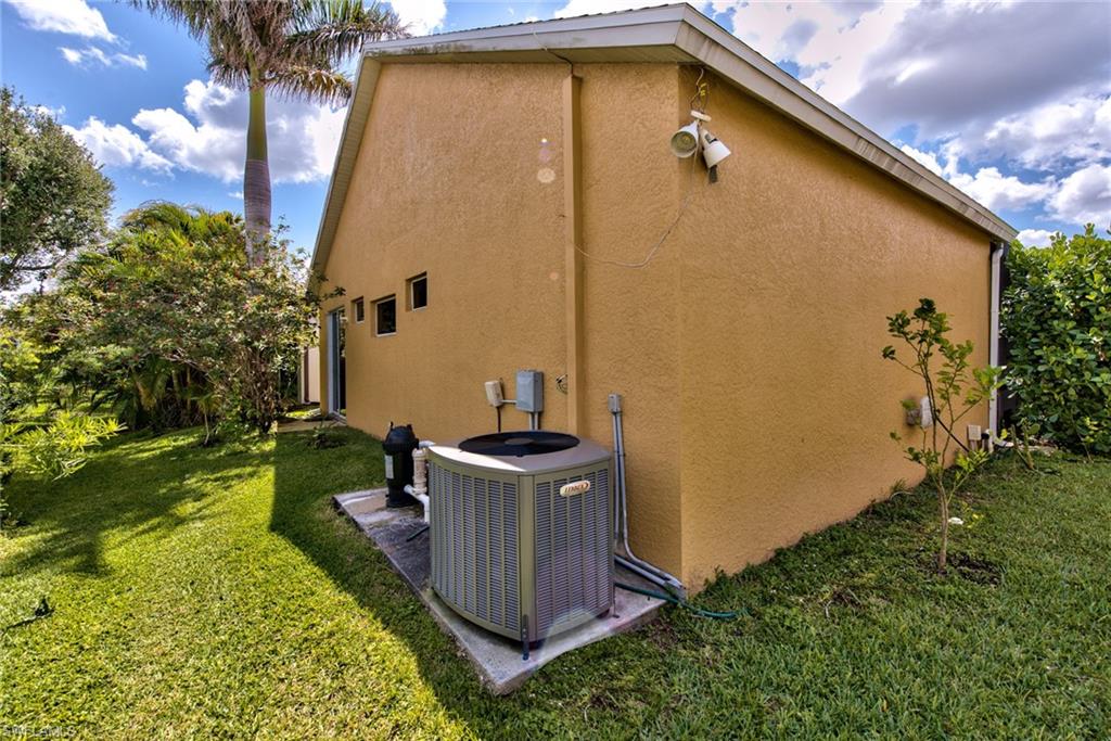 3748 Kent Drive Naples, FL 34112 - Photo 26 of 30 a view of a backyard with plants