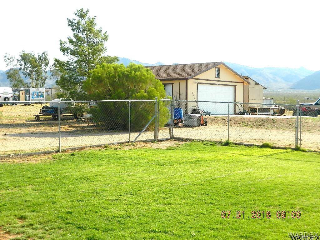 3842 North Avra Road Golden Valley, AZ 86413 - Photo 17 of 21 Luscious Green back yard