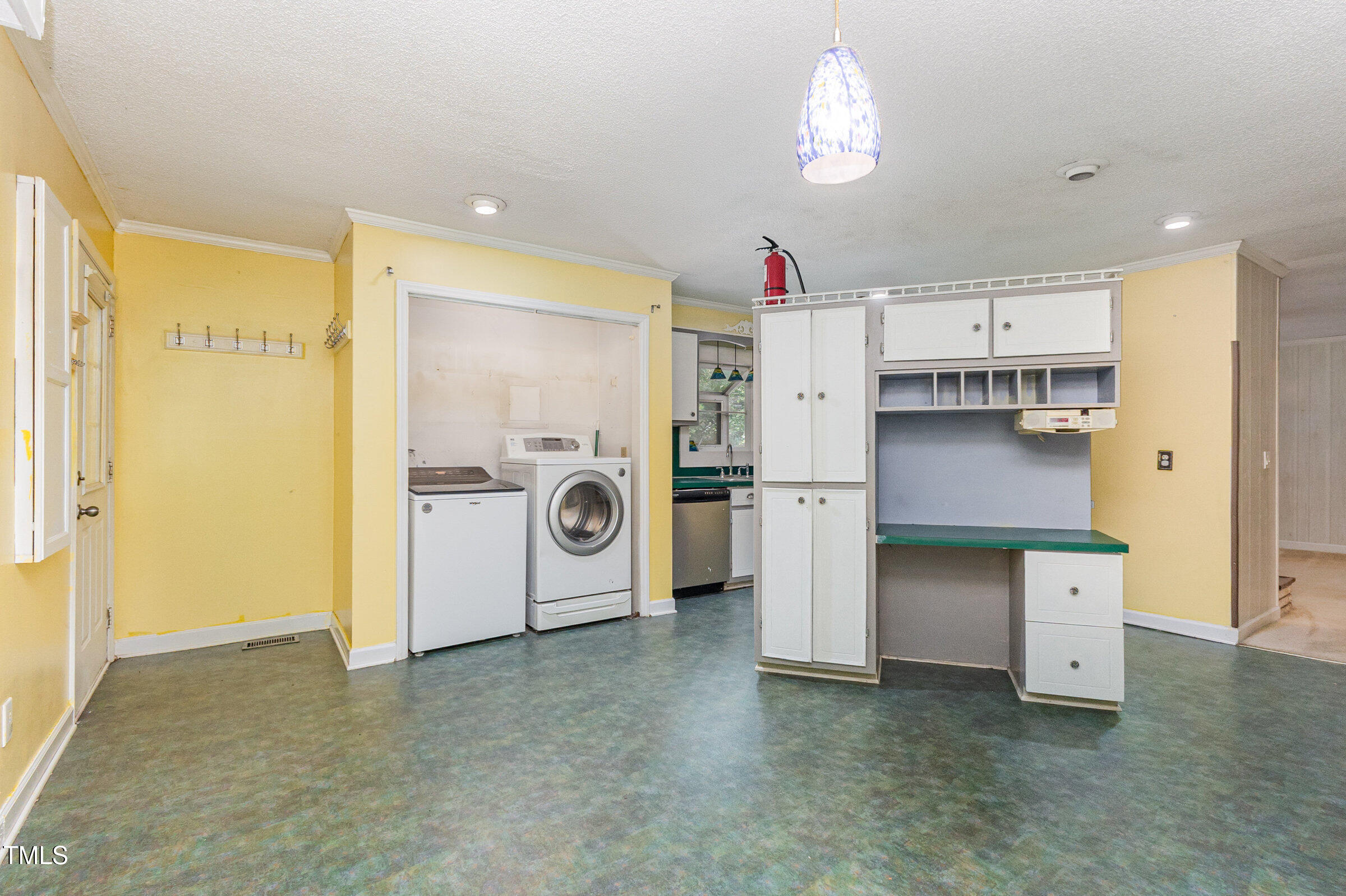 817 Bent Creek Road Bahama, NC 27503 - Photo 9 of 45 a kitchen with stainless steel appliances granite countertop a refrigerator a stove and a sink